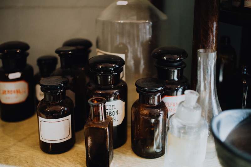 container, text, still life, healthcare and medicine, variation, close-up, no people, filled, retro, wood - material, arrangement, label, focus on foreground