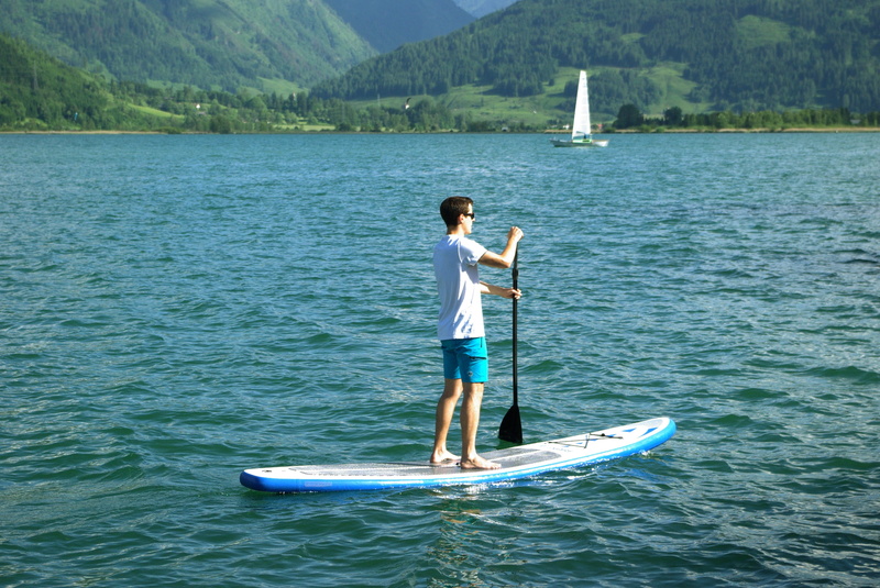 non-urban scene, beauty in nature, full length, Lake, salzburger land, Zell Am See, Water, one person, day, scenics - nature, leisure activity, casual clothing
