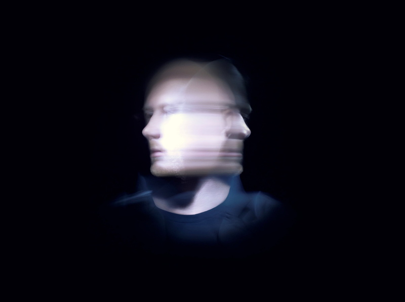 lighting equipment, eric prydz, portrait, men, illuminated, glowing, black background, front view, studio shot, innovation, close-up, mystery, dark, one person