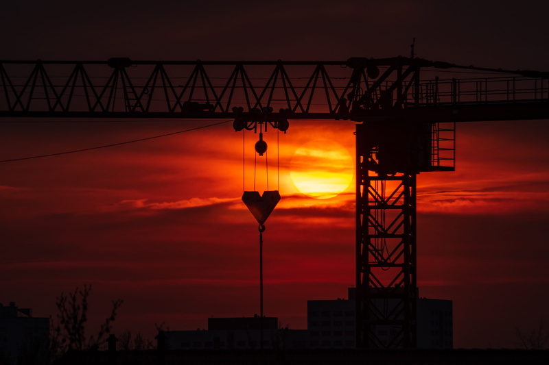 metal, hardhat, 5K, architecture, sunset, dusk, built structure, letter, construction crane, cylinder, low angle view, sky, machinery, bridge - man made structure
