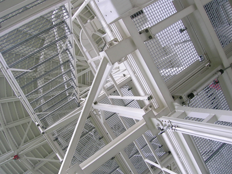 pattern, staircase, building, radio waves, science, directly below, radio telescope, glass - material, ceiling, day, metal, architecture, modern, silver colored