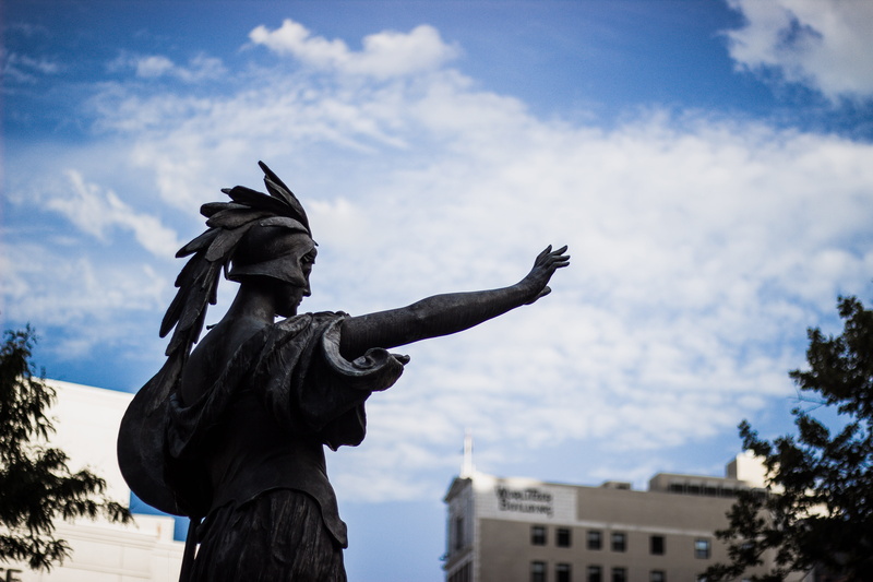 day, statue, built structure, building exterior, sculpture, nature, motor city, detroit, monument, cloud - sky, craft, human representation, outdoors, low angle view