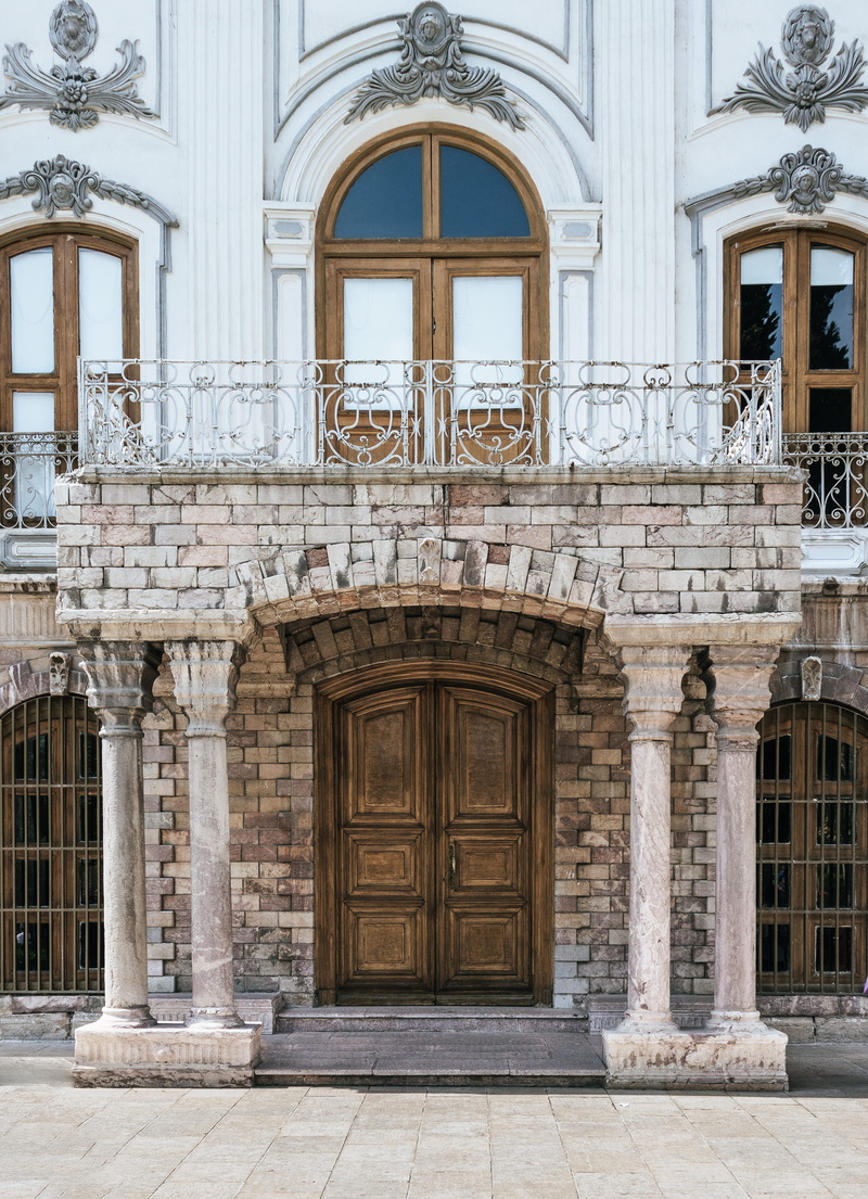 building exterior, old, building, history, flagstone, window, ornate, travel, arched, brick, the past, facade, walkway, no people, belief, pavement, place of worship