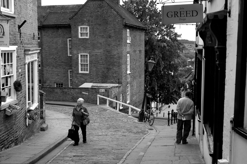 lifestyles, men, building exterior, real people, day, women, shop sign, communication, city life, outdoors, black And White, text, england, 2K, lincolnshire