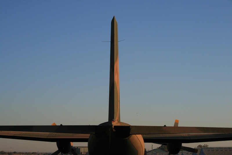built structure, camouflage color sheme, blue, copy space, architecture, Tailplane, 4K, real people, Tail Section, troop carrier, no people, retired, clear sky