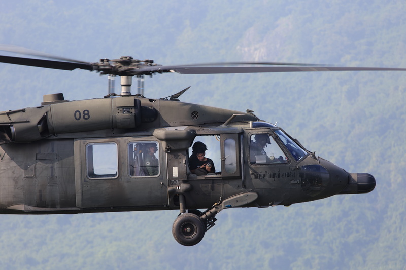 flight, armed forces, plane, mode of transportation, one person, sky, air force, man, real people, flying, uniform, riding, aerospace industry, nature