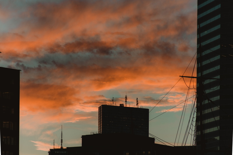 office building exterior, orange, sky, orange color, cloud - sky, harbor, low angle view, boston, silhouette, boston tea party ships and museum, building