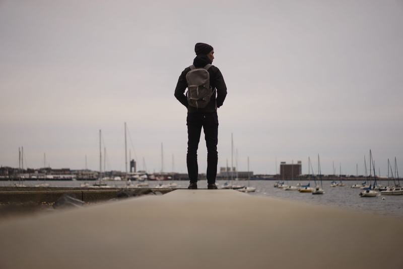 full length, standing, leisure activity, boat, harbor, young adult, land, hands in pockets, boston, sky, united states, sunset, rear view, nature, outdoors