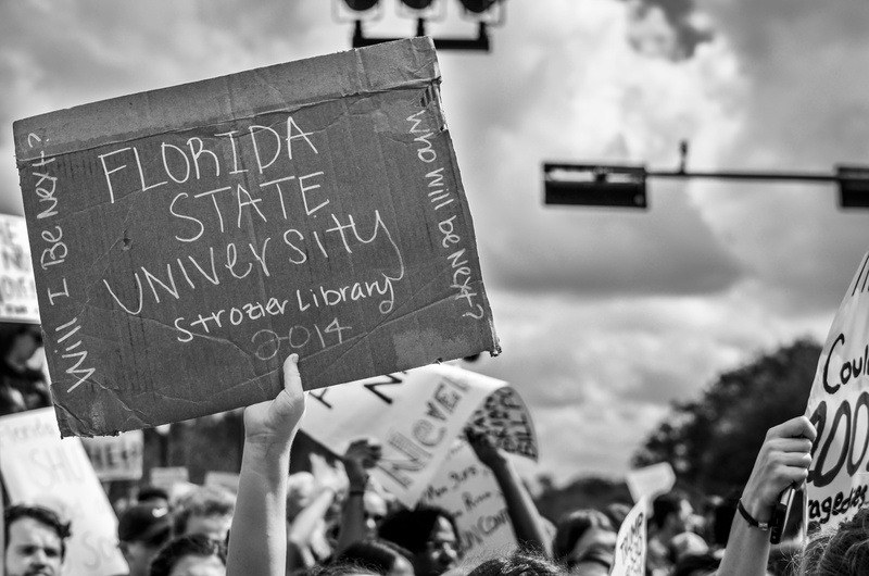 state, graduation, handwriting, crowd, architecture, person, group of people, board, people, university, finger, message, holding, day, florida, information