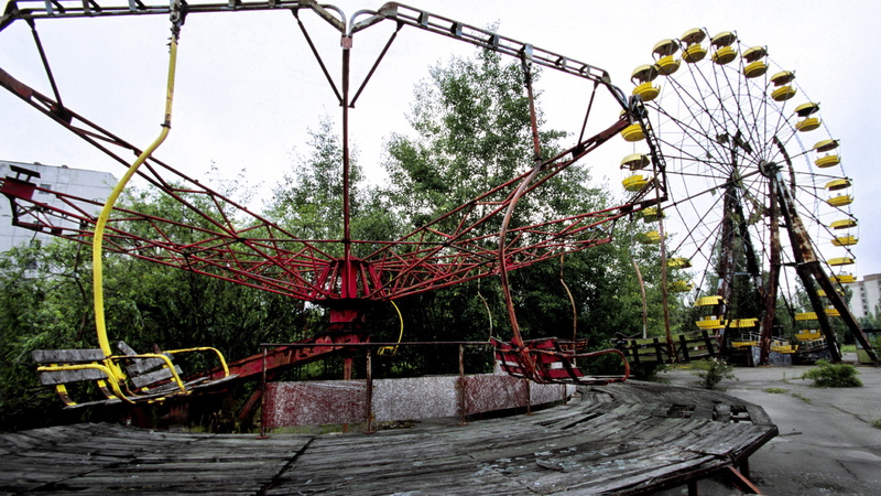low angle view, architecture, fairground, wood - material, leisure activity, ruins, ferris wheel, amusement park ride, nature, arts culture and entertainment