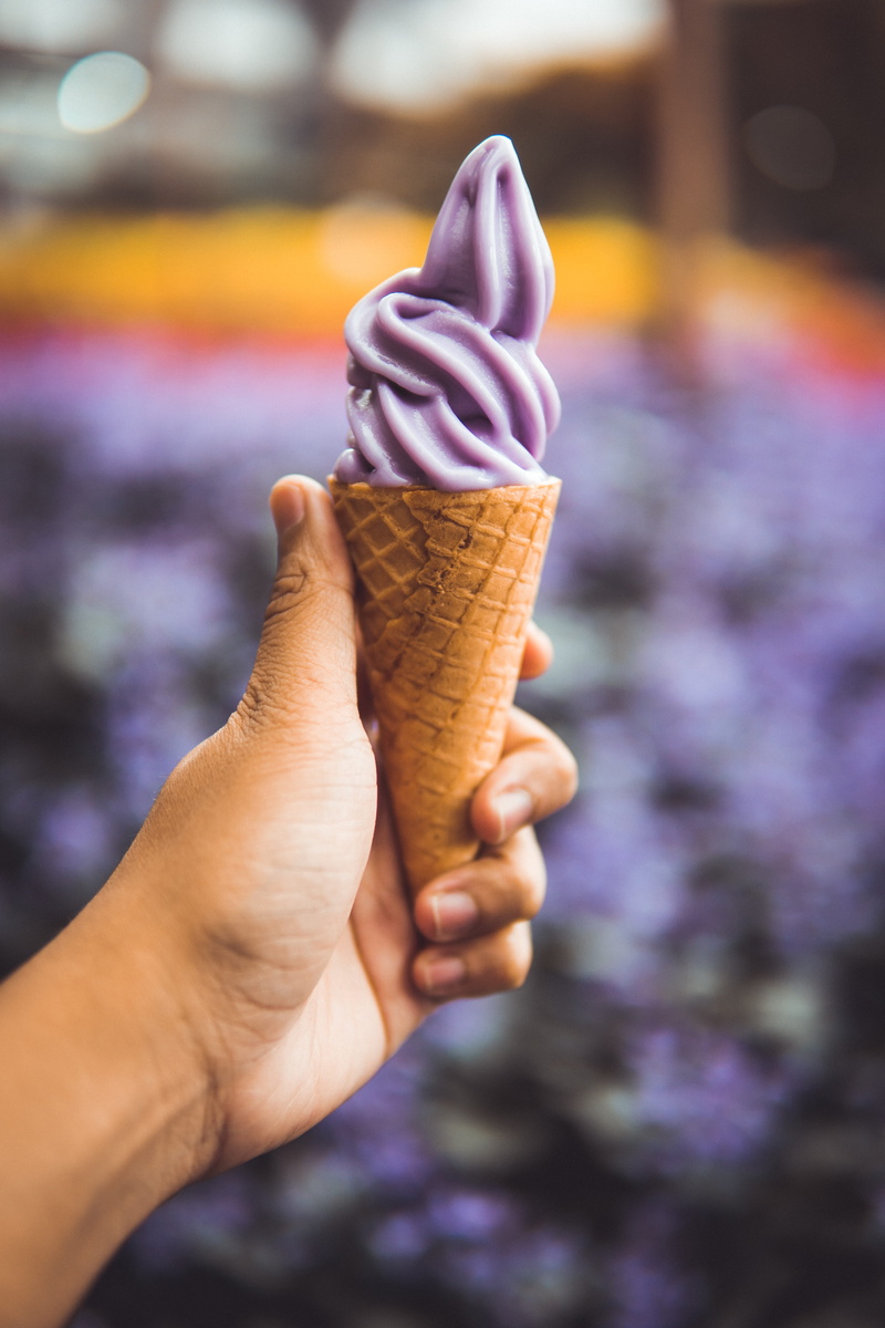 confectionery, cake, cone, focus on foreground, frozen, hand, unhealthy eating, person, frozen sweet food, cream, ice, creme, indulgence, coffee cup, one person