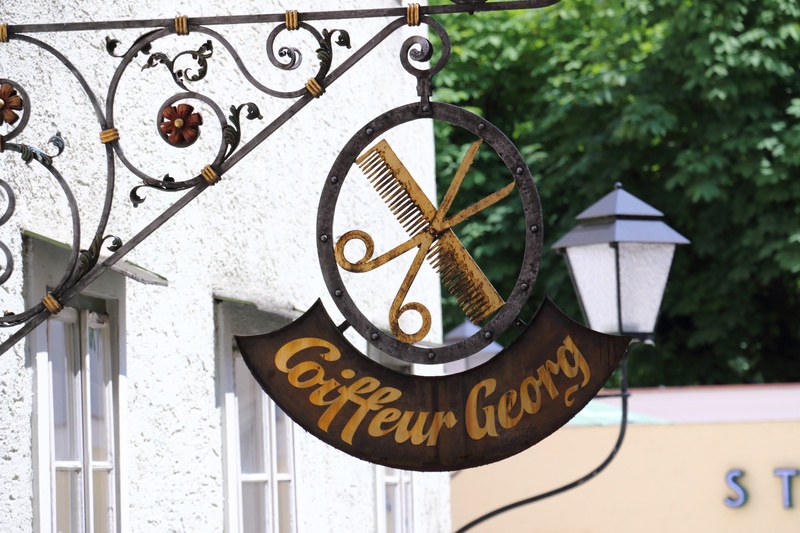 text, facade, window, western script, wall clock, design, 2K, communication, day, sign, focus on foreground, comb, city, clock, salzburg, no people, instrument of time