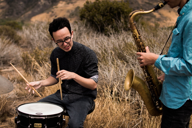 drummer, musical, instruments, field, casual clothing, person, sax, musical instrument, 5K, togetherness, emotion, collaborate, brown, two, outdoors, adult