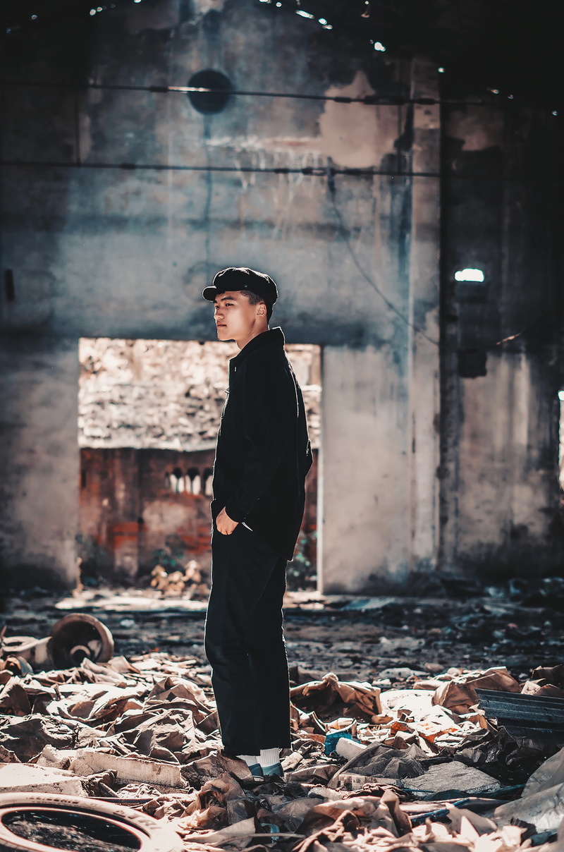 males, shirt, outdoors, urban Scene, street, serious, person, standing, factory, fashion, style, black, sleeved, young Adult, adult, man, warehouse, hat