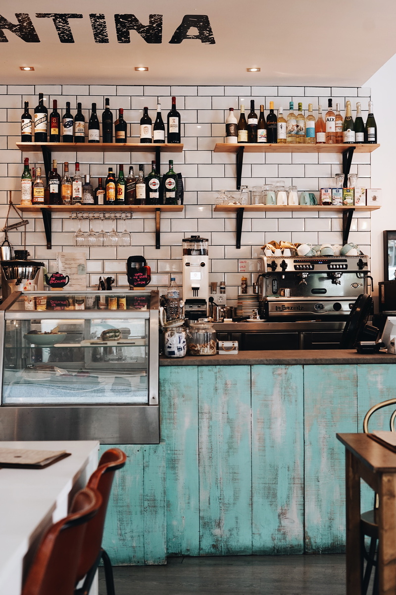 kitchen, day, assorted, domestic room, business, coffee, transparent, household equipment, lot, beverages, shelves, food, wall, table, wall - building feature