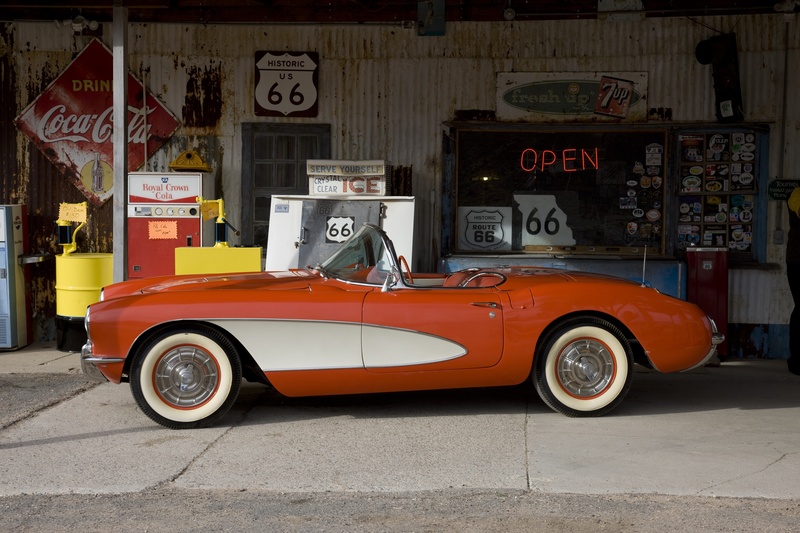 route 66, city, road, no people, built structure, near, convertible, car, day, corvette, building exterior, text, mode of transportation, classic, architecture