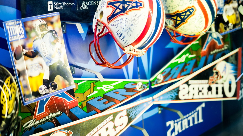 outdoors, football, communication, multi colored, retail, market, memorabilia, choice, day, technology, no people, number, text, sunlight, poster, metal