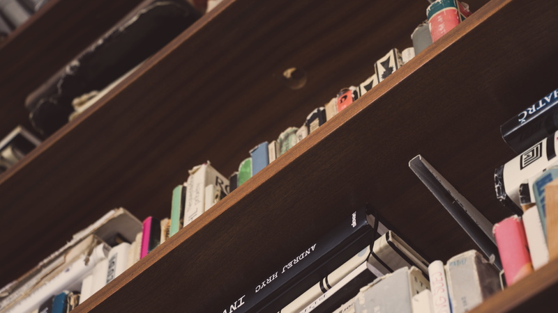 large group of objects, low angle shot, day, close-up, business, no people, book, low angle view, shelf, wooden, variation, order, tilt, bookshelf, focus on foreground