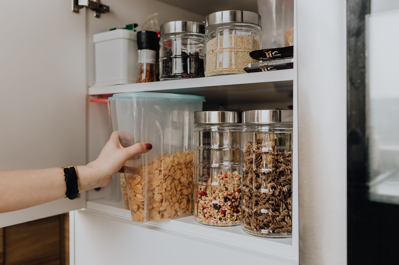 freshness, morning, jar, preparing food, human body part, 5K, kitchen, breakfast, holding, adult, domestic room, cereal, home, one person, cupboard, human hand