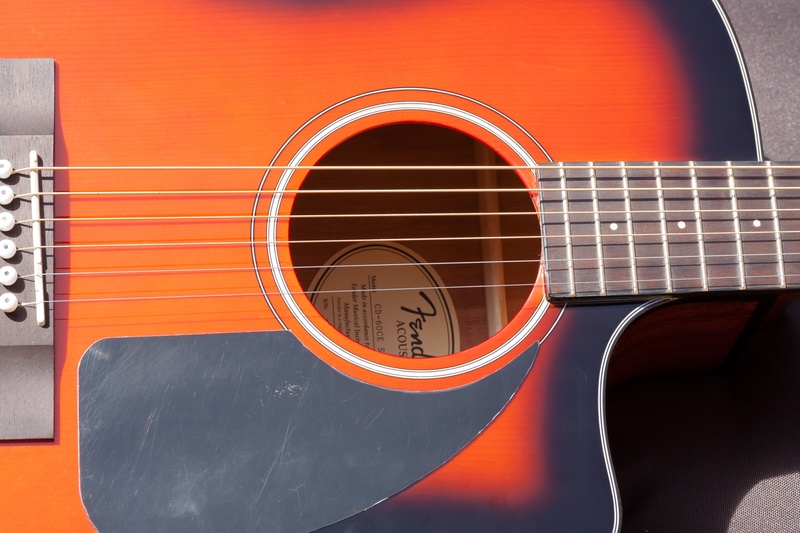 musical instrument, stretched strings, fretboard, eddy, close-up, lacquered, circular sonar, classic, musical instrument string, no people, acoustic guitar