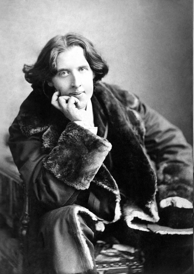 one person, vintage, Oscar Wilde, males, looking at camera, smiling, portrait, adult, 2K, Writers, archival, men, three quarter length, food and drink
