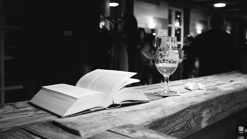 still life, reading, paper, table, wood - material, book, wine, menu, leisure, text, pub, wood, restaurant, drinking glass, focus on foreground, calm, close-up