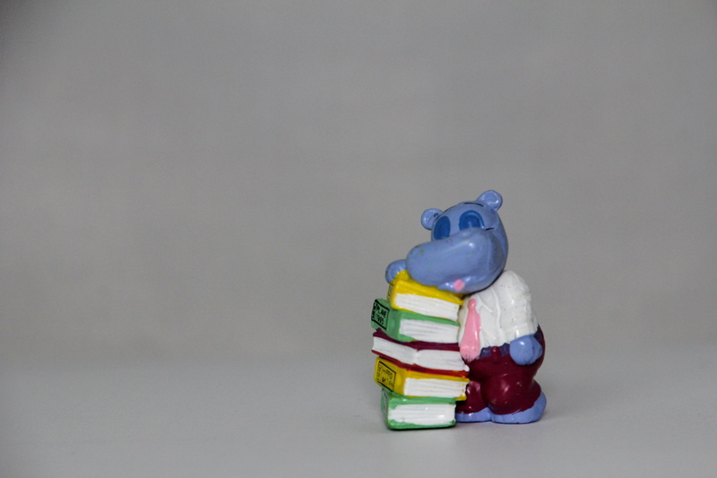 studio shot, indoors, stack, large group of objects, career, business, no people, toy, white background, abundance, multi colored, art and craft, gray background