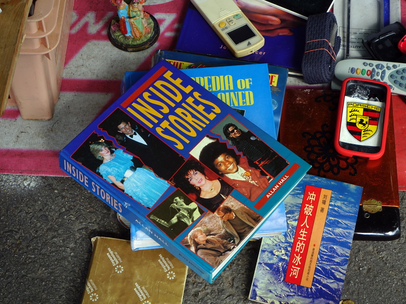 male likeness, souvenir, non-western script, script, close-up, outdoor, king of pop, representation, for sale, publication, choice, art and craft, book