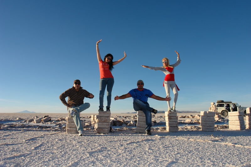 day, clear sky, desert, sky, arms raised, happiness, salt, sunlight, people, posing, clear, human limb, leisure activity, holiday, human body part, positive emotion