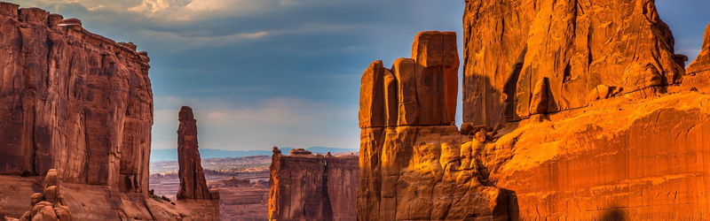 sky, travel, environment, outdoors, architecture, solid, rock, cloud - sky, history, beauty in nature, canyon, nature, day, rock formation, landscape, travel destinations