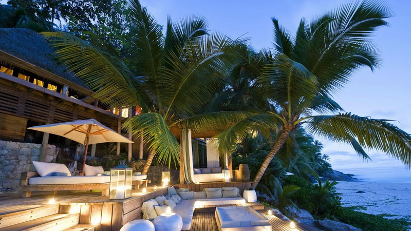 vacation, island, nature, holiday, architecture, coconut palm tree, water, tropical tree, seychelles, sky, outdoors, beauty in nature, hotel, travel destinations
