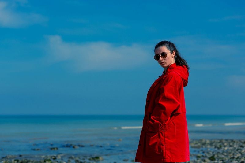 person, standing, plage, apparel, sunglasses, horizon, human, blue sky, quiberville, hair, girl in red, three quarter length, near, beach, leisure activity
