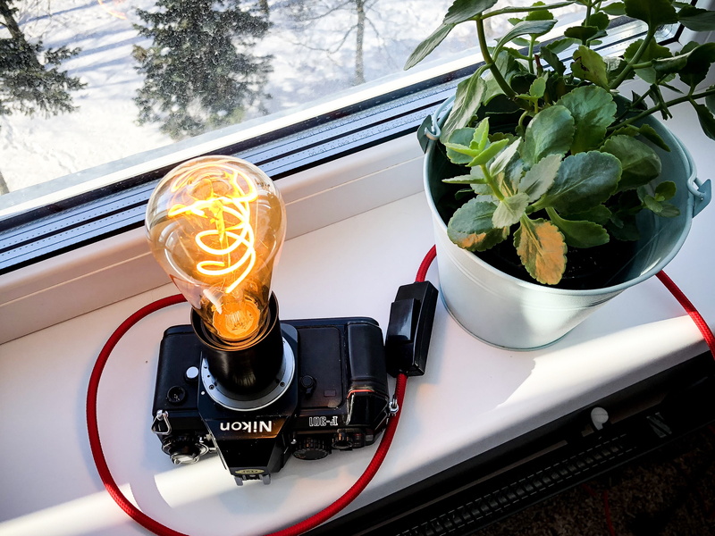 red, camera, white, table, refreshment, freshness, drink, nature, indoors, 2K, window, no people, cord, land vehicle, car, red cord, lamp, close-up, motor vehicle