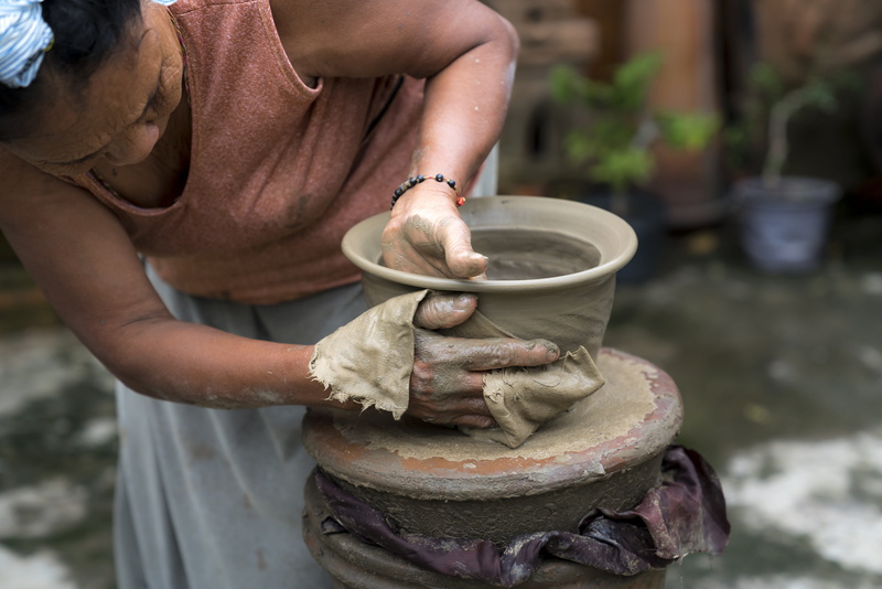 hand, one person, craftsperson, travel, horizontal, skill, creation, artist, market, throw, photography, wheel, production object, preparation, creativity