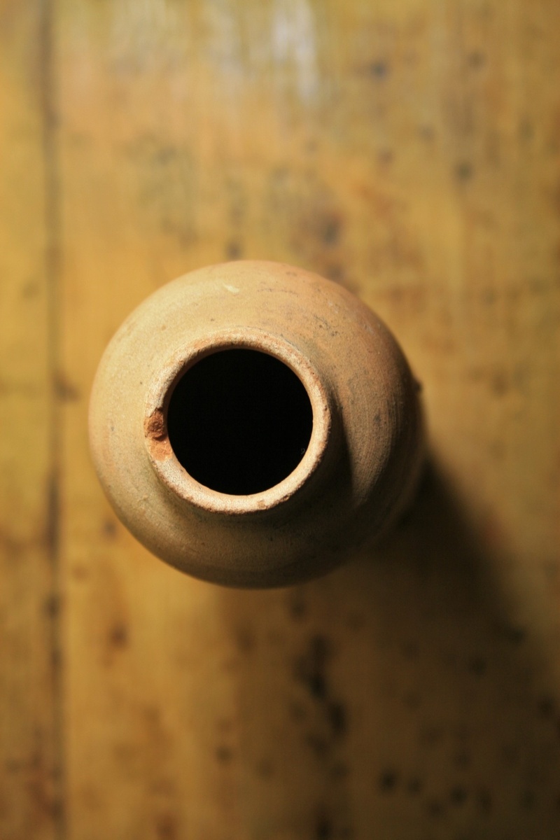 terracotta, ornament, focus on foreground, metal, beige, toilet paper, handmade, culture, craft, top, handicraft, rolled up, wood - material, mud, elongated