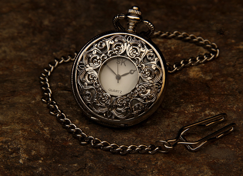 focus on foreground, pocket, sk, chain, jewelry, table, pocket watch, metal, ornate, 2K, old, close-up, instrument of time, history, silver colored, clock face