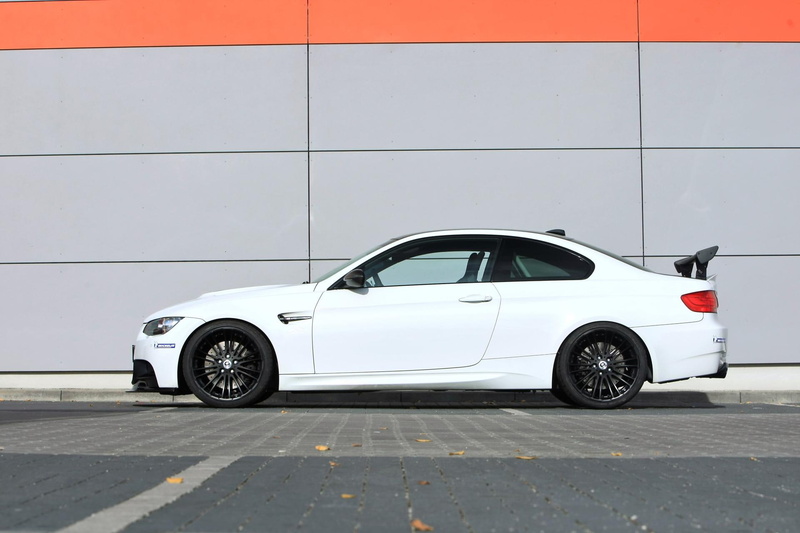side view, m, gts, garage, stationary, bmw, g, no people, luxury, built structure, power, wheel, mode of transportation, sk, motor vehicle, transportation