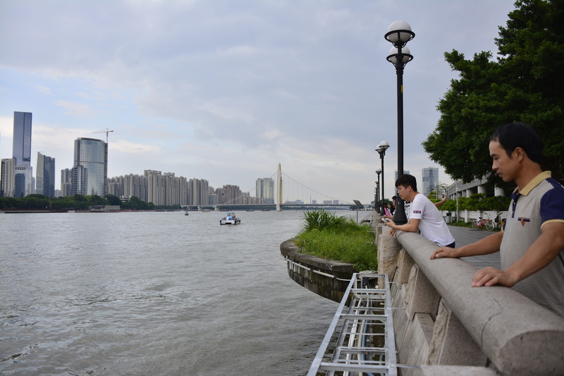 modern, tourist, waterfront, tourism, real people, togetherness, zhujiang, building exterior, cityscape, urban, sitting, full length, adult, men, lifestyles