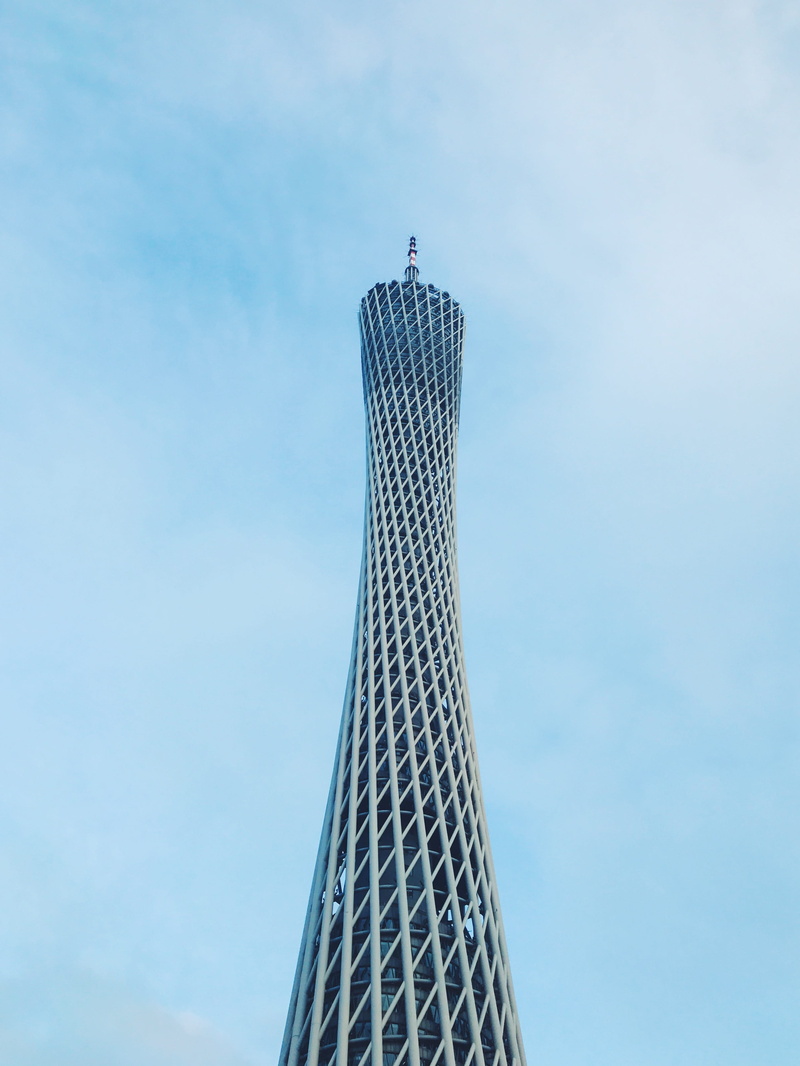 low angle view, sky, outdoors, day, city, tall - high, built structure, canton, architecture, skyscraper, travel destinations, travel, le million bin, building