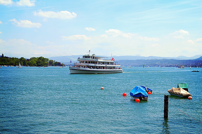 switzerland, passenger craft, lake boats, scenics - nature, mode of transportation, sun, natural water, outdoors, day, water, sky, incidental people, travel destinations
