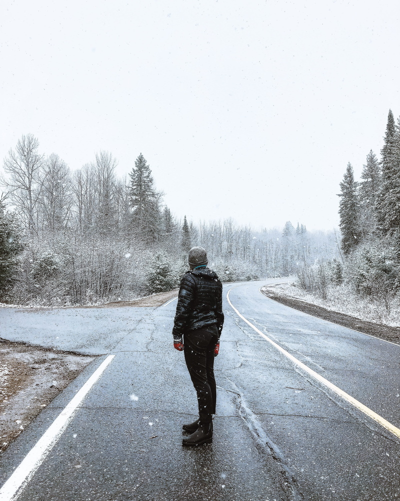adventure, extreme weather, camp, one person, transportation, real people, leisure activity, diminishing perspective, outside, photography, explore, full length