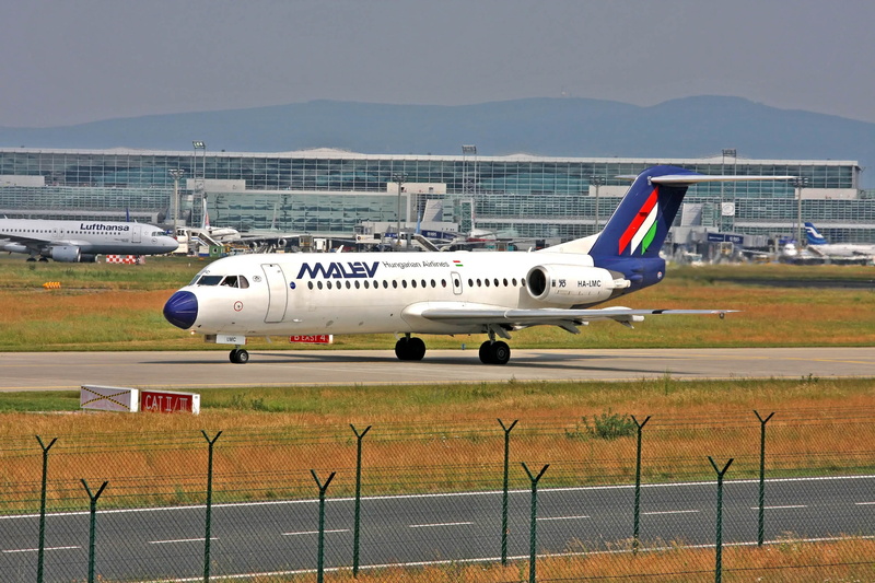 outdoors, commercial, barrier, airport, public transportation, flying, frankfurt, day, commercial airplane, airport runway, clear sky, fence, nature, transportation