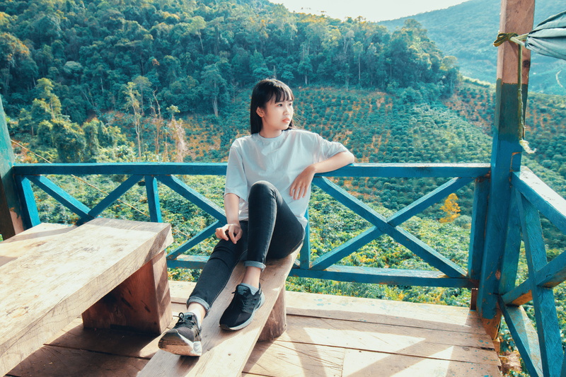 balcony, young men, full length, brown, bench, railing, woman, leisure activity, plants, young, mountains, plantation, outdoors, lifestyles, daylight, plant