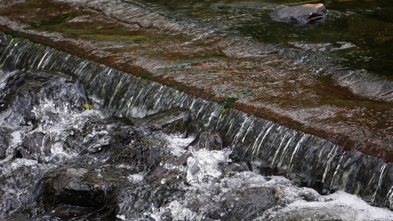 flowing water, power in nature, nature, beauty in nature, long exposure, motion, a small waterfall, rock formation, blurred motion, water, non-urban scene