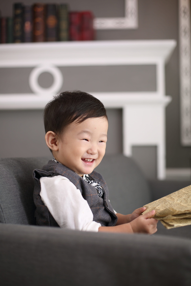 read, Laugh, child, indoors, emotion, one person, food, one boy only, men, happy, Happy, sat, front view, males, sofa, 4K, life, home interior, cute, happiness