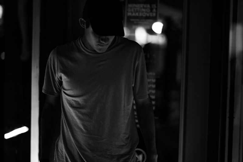 crew, t-shirt, trucker, hood - clothing, focus on foreground, social issues, near, adult, communication, male, man, night, 8K, waist up, indoors, one person