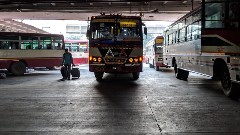 travel, vehicle, wheel, architecture, india, shadow, standing, transportation, day, city, tour bus, land vehicle, minibus, terminal, 2K, incidental people