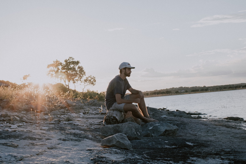 solid, adult, daytime, leisure activity, day, shore, outdoors, sun, tree, water, nature, sitting, side view, rock, 5K, thinking, one person, ripple, wafe