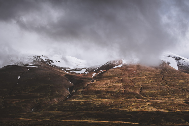 outdoors, covered, winter, dramatic landscape, travel destinations, rock - object, mountain peak, beauty in nature, mountain, snowcapped mountain, tranquil scene
