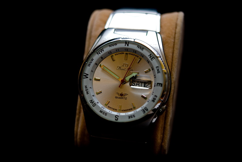 indoors, wristwatch, instrument of time, instrument of measurement, timer, stopwatch, cut out, personal accessory, navigational compass, metal, timepiece